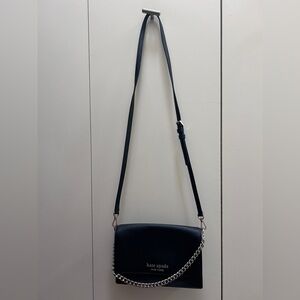 Cute and fun Black Kate Spade crossbody / hand held purse